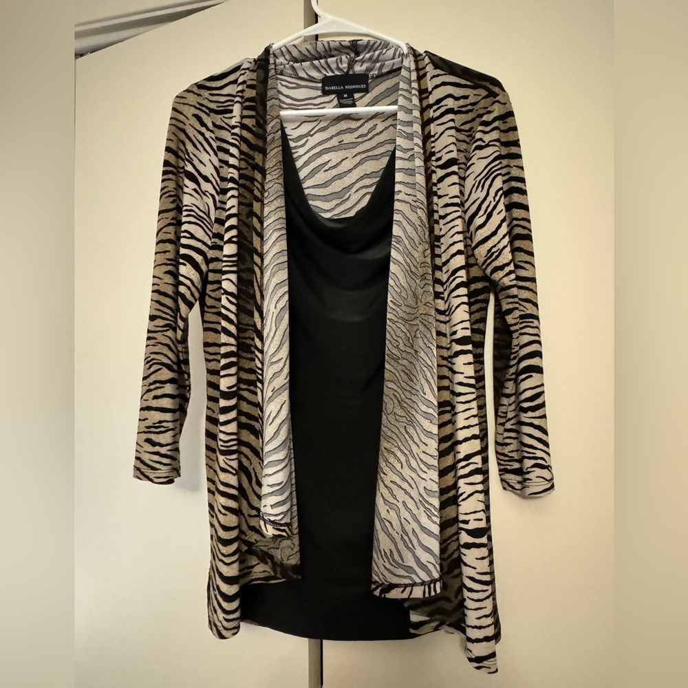 Tiger print over black connected set blouse.